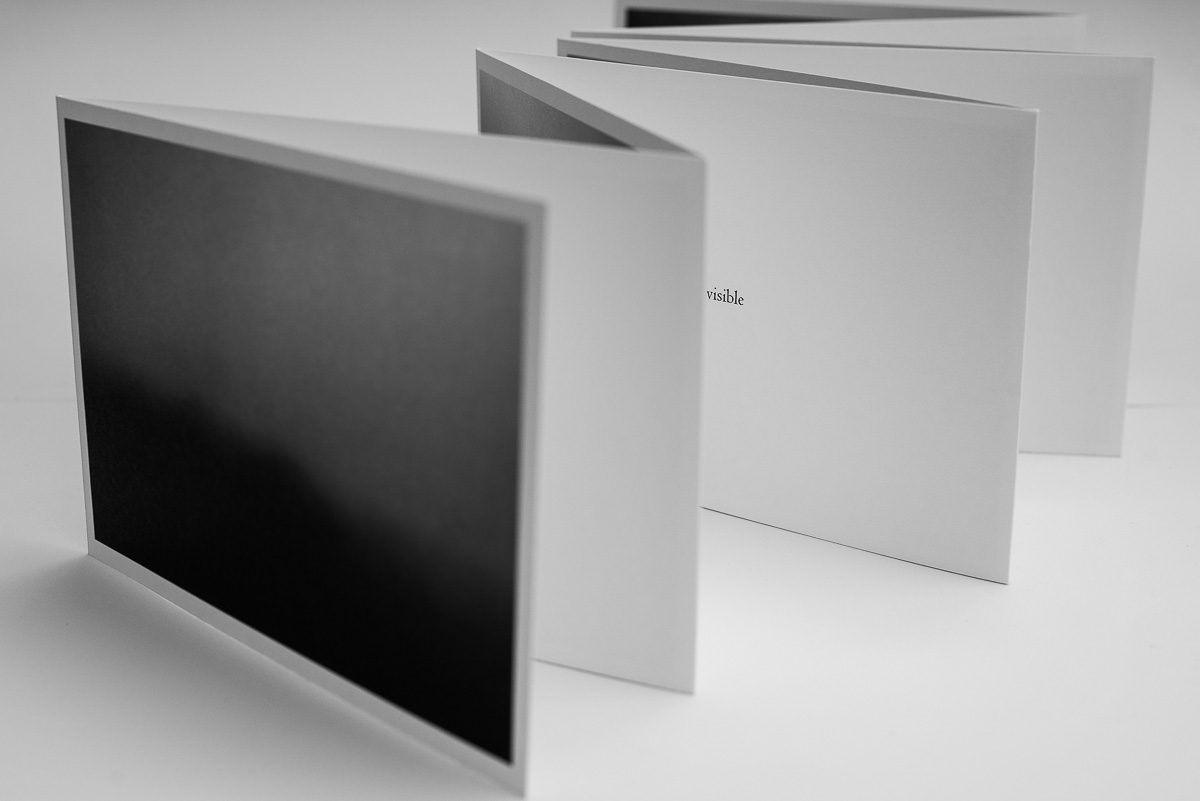 Box + Fold-out book + Copy